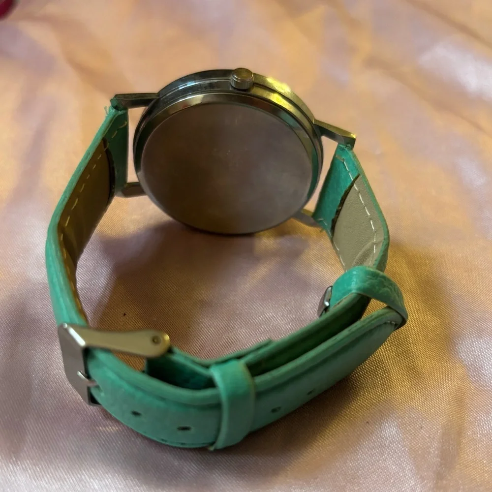 Teal Wristwatch with Quirky Dial